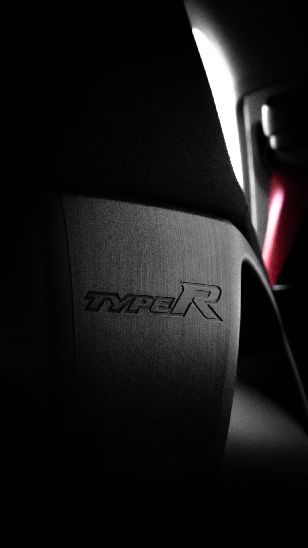 Type R embossed seat back in low light