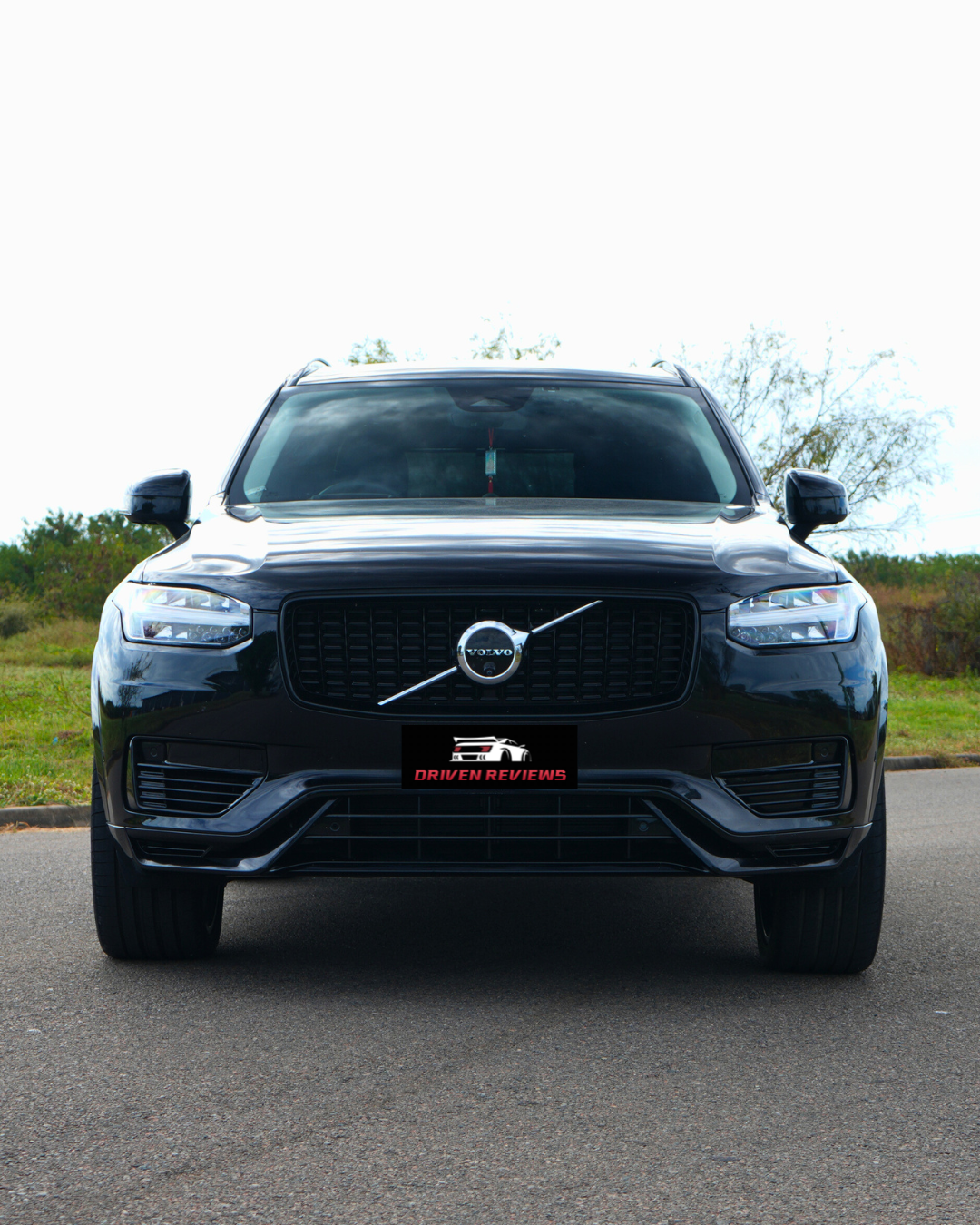 Volvo XC90 head-on with a Driven Reviews plate