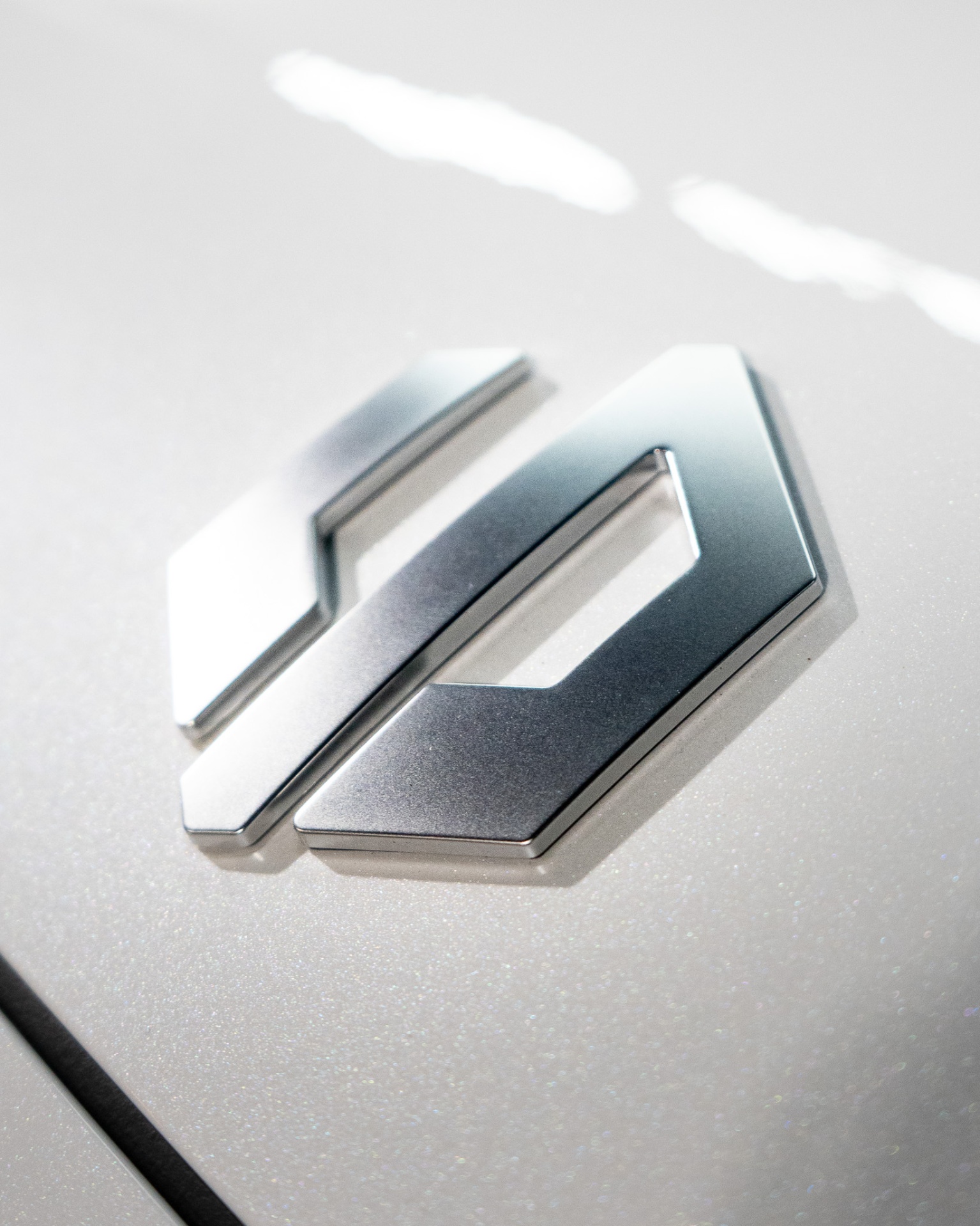 Leapmotor badge detail on white bonnet